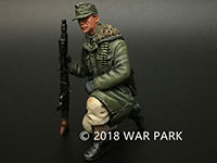 Tank rider kneeling with MG