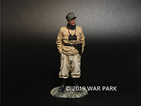 Officer standing with hands in pocket